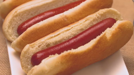 Delicious-hot-dogs-with-a-selection-of-condiments-on-the-side