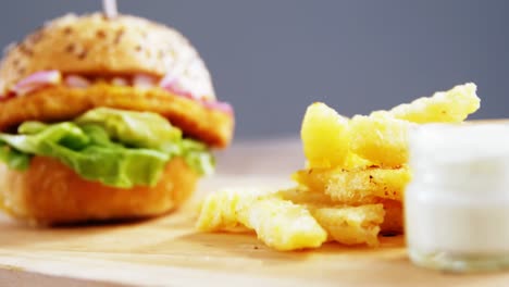 hamburger and french fries with mayonnaise