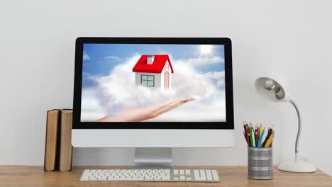 animación de la casa en las nubes en la pantalla de la computadora.