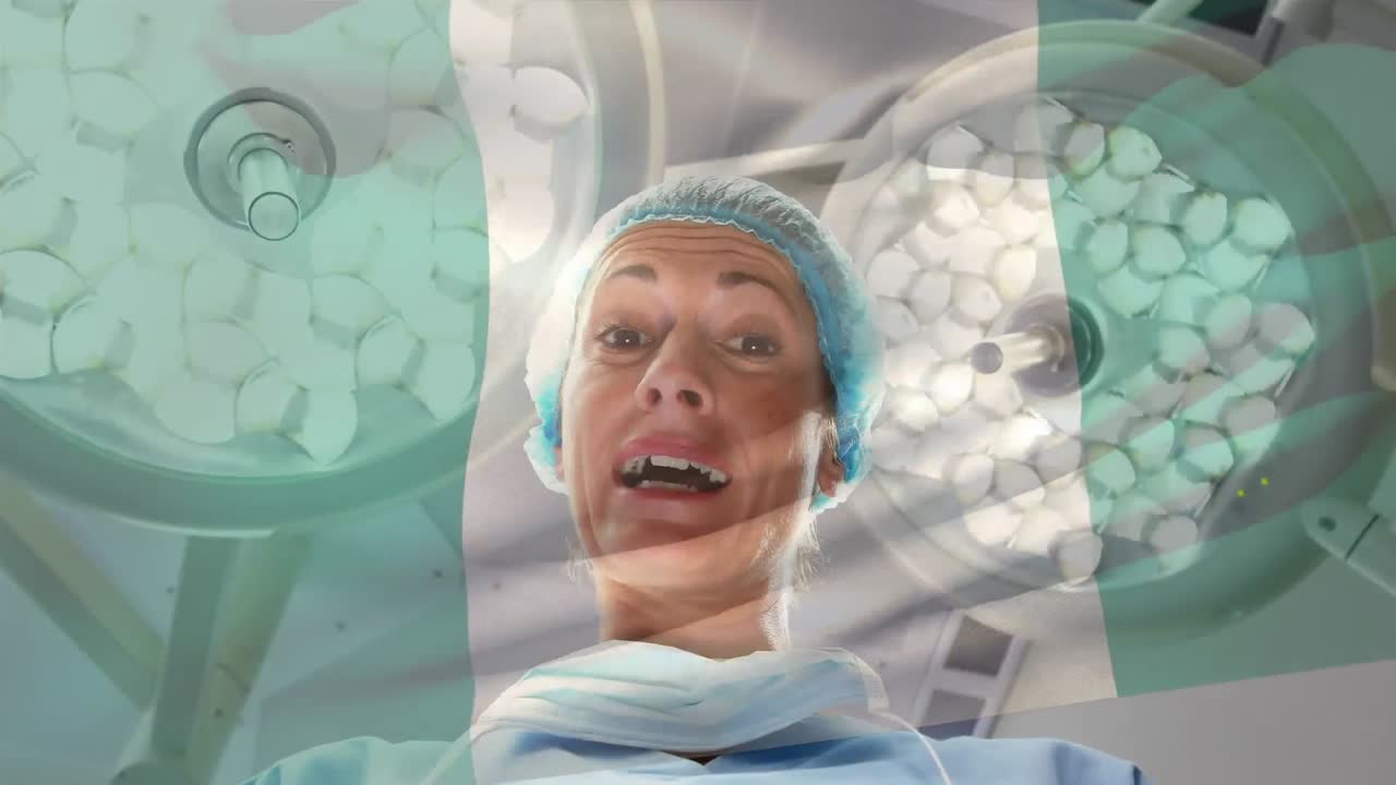 animación de la bandera de nigeria ondeando sobre el anestesiólogo en el quirófano