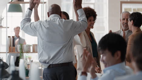happy business people celebrating successful corporate victory colleagues high five in office meeting enjoying winning success