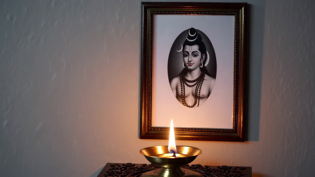 Hindu Prayer with Shiva Portrait and Lamp
