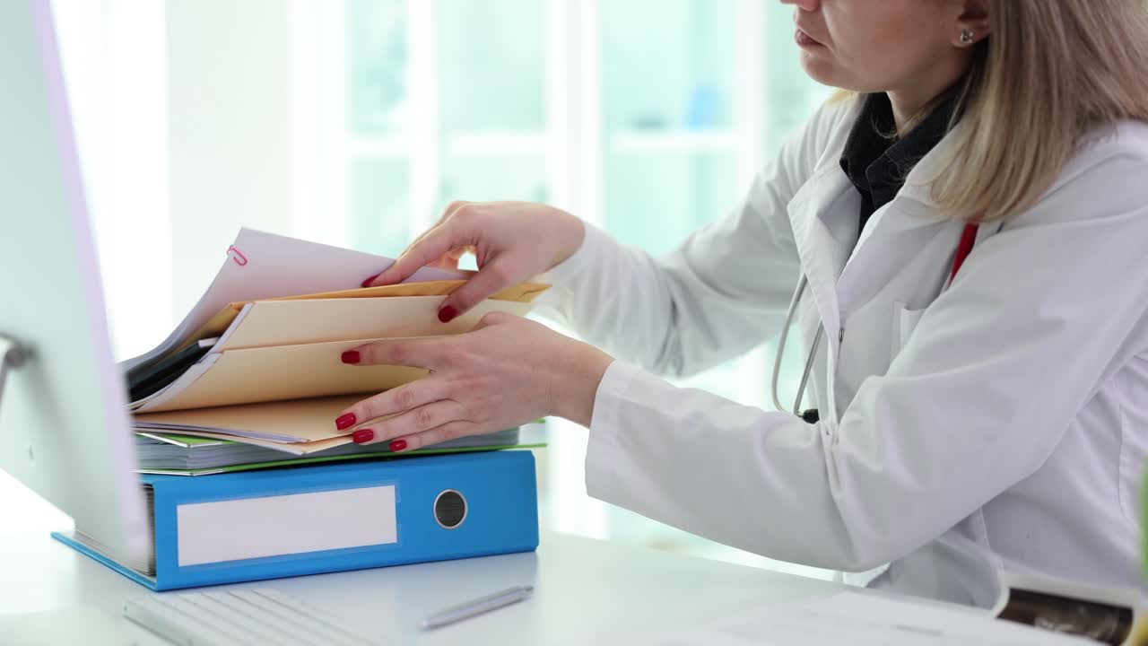Doctor Organizes Patient Records