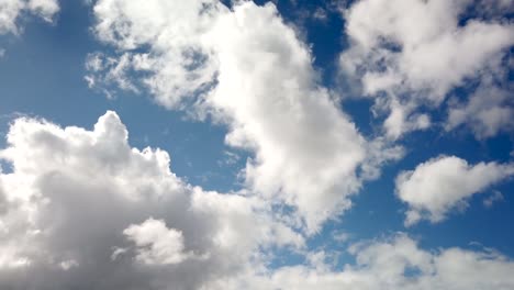 cumulus clouds in blue sky billow and form, cloudscape time lapse