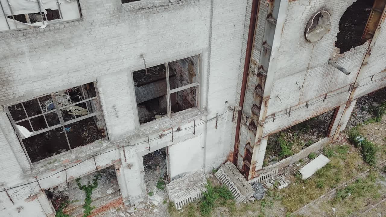 Aerial view of a destroyed factory during the war. Abandoned industrial building.