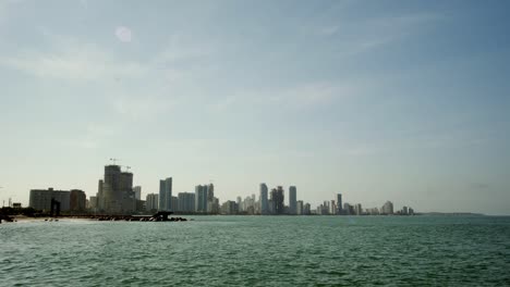 Sea-by-Cartagena-with-distant-skyscrapers-on-clear-day