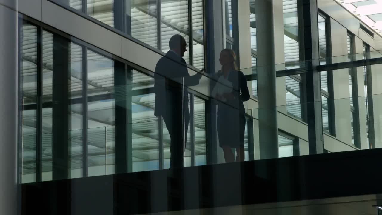 Business people interacting with each other