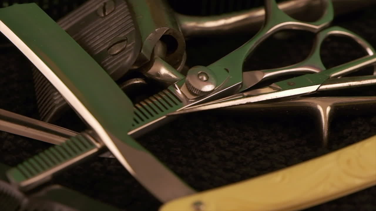 Rotating macro: barber's straight razor with thinning shears, clipper