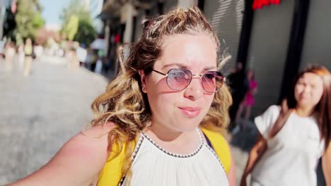 athens street style: young woman vlogging