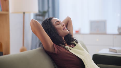 woman relaxing on sofa