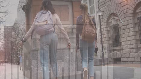 animación de datos financieros y gráficos sobre la vista posterior de las amigas caucásicas