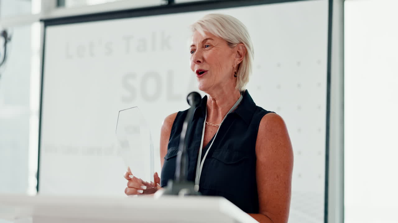 Woman Receiving an Award at a Conference