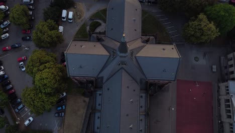 flight from above view down flying between the spiers clearly visible silhouette of the cross