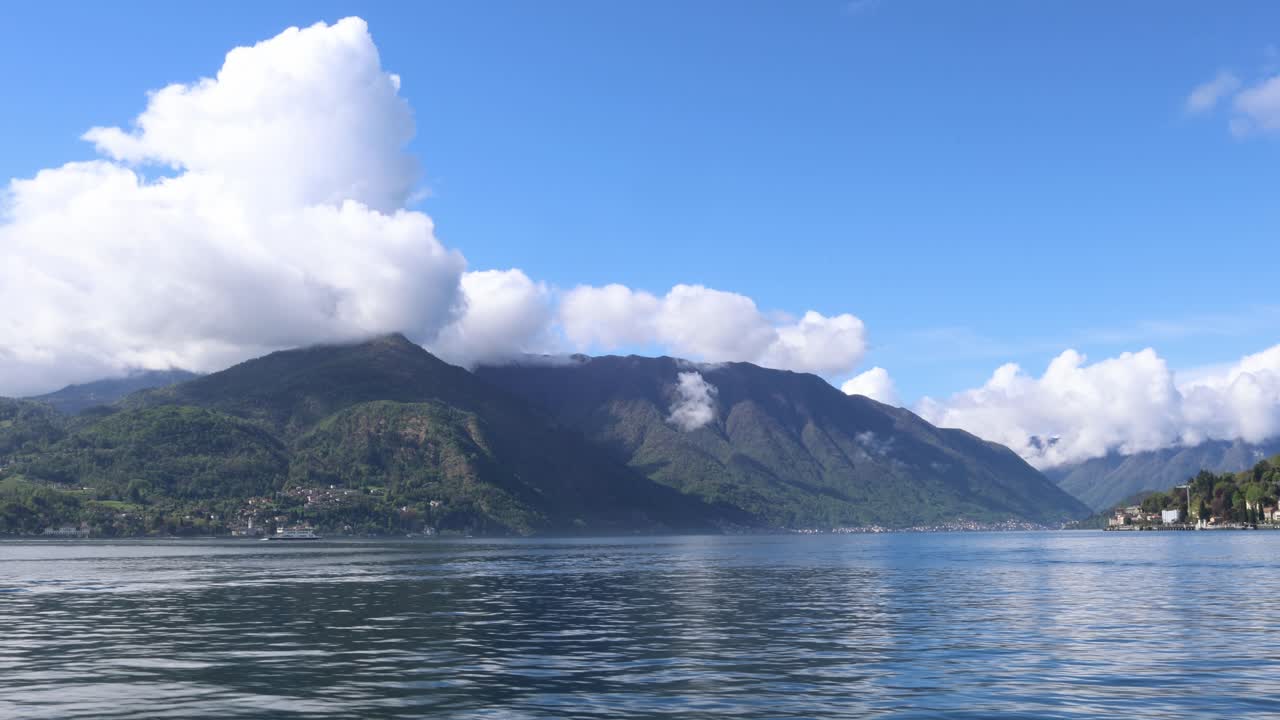 Crossing lake Como on a boat, first person view