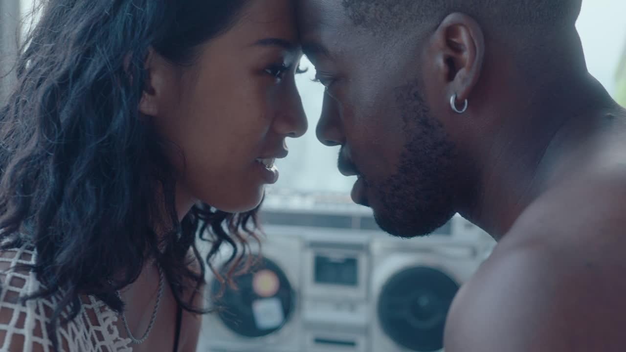 Young Loving Couple Touching Foreheads and Rubbing Noses