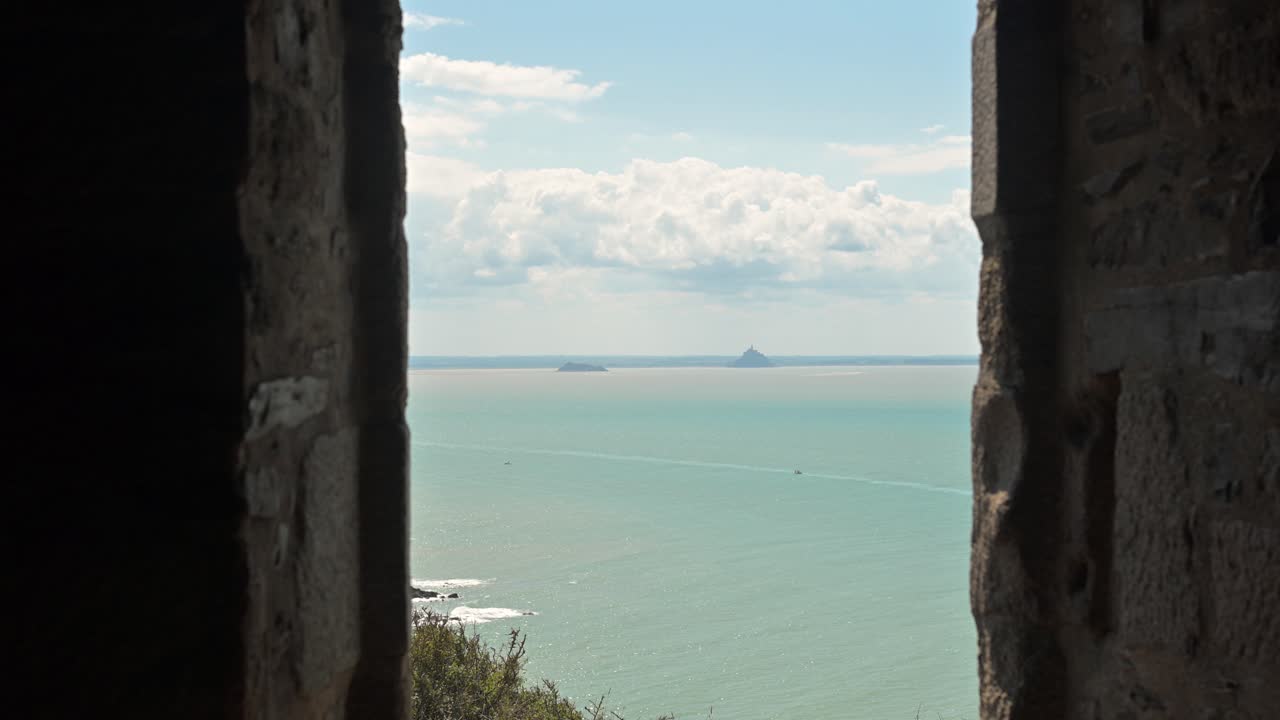 Mont Saint-Michel appears on the horizon from within Carol’s cabane, combining Normandy’s coastal heritage and natural scenery
