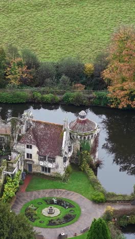 medieval moated mansion scotney castle, kent, uk, vertical aerial view