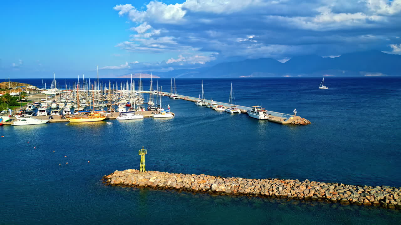 Aerial View of a Calm Marina with Boats and Yachts