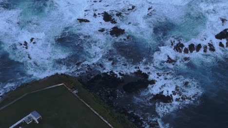 top down view of lighthouse farol de albarnaz at flores island azores - drone shot
