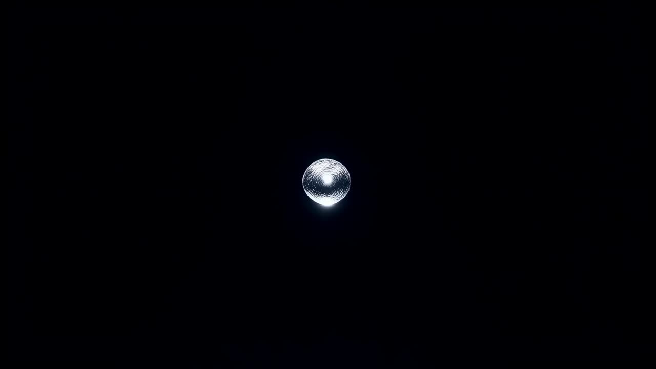Appearing core emitting filaments, ribbons in void, flaring, releasing energy and scattering sparks