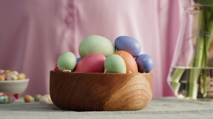 Happy Easter holiday. Colored eggs close-up. Preparing for Easter, painting and decorating eggs. Christian celebration, family traditions.