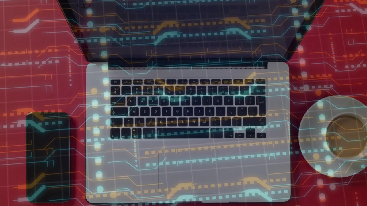 Animated digital overlay appearing over silver laptop, scrolling and pulsing to visualize data flow