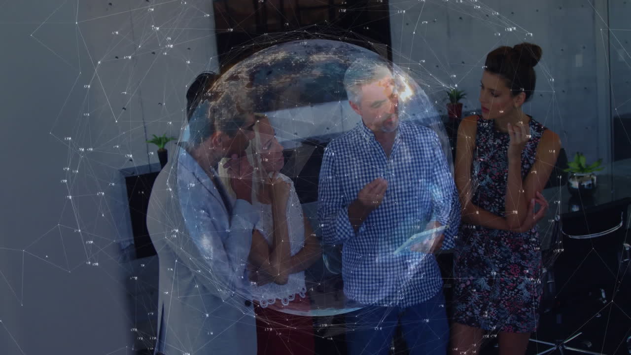 Business team exploring holographic globe with network lines, discussing data insights in office