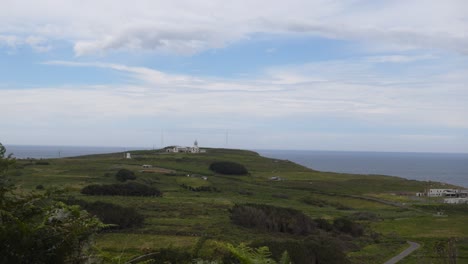 4K-Walking-long-view-Footage-of-Estaca-de-Bares-in-galicia,-lighthouse-and-shelter-ruins-on-a-Cloudy-Day,-panoramic-view-with-sony-rx100-va,-Cabo-Ortegal