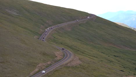 car driving at high altitude mountain road in colorado