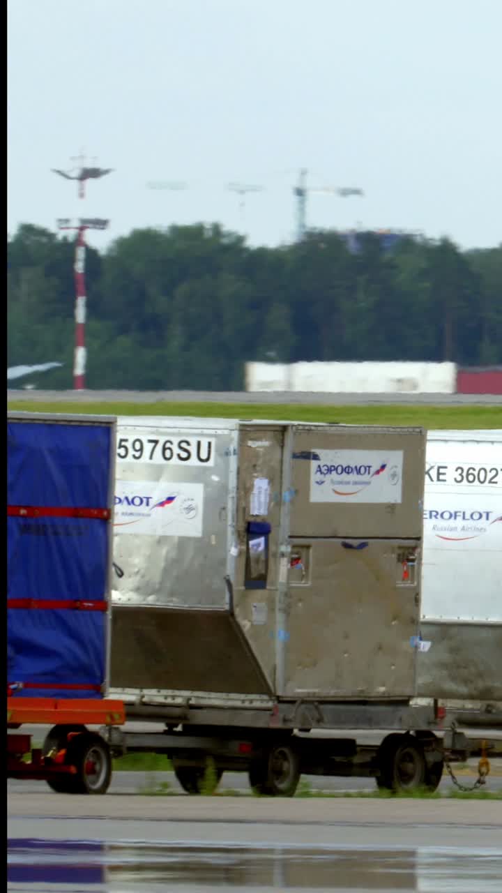 Aeroflot cargo containers at an airport