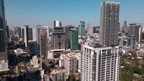 aerial view over bangkok city, lots of high rise buildings