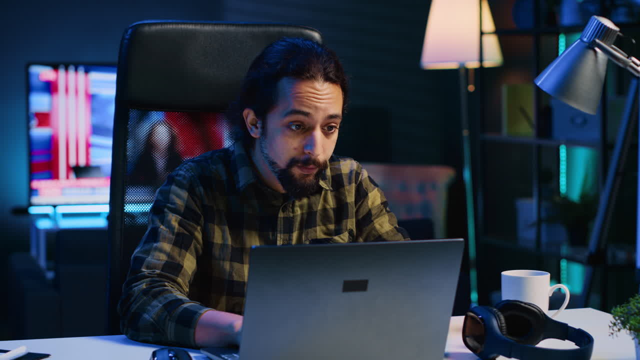 Remote worker using electronic device to send emails