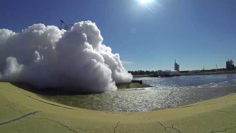 a rocket engine is tested creating a huge cloud of smoke