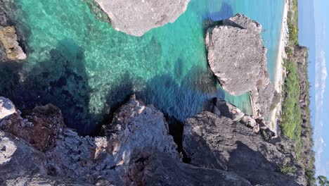 Vertical-View-of-rocky-beach-in-Pedernales,-Dominican-Republic