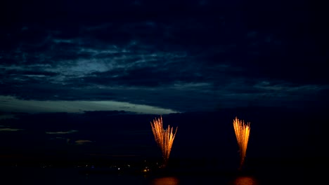 firework from boat on evening sky