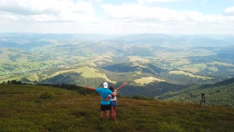 tourist in love enjoys the mountain views tourists rest while hiking in the mountains nature photography