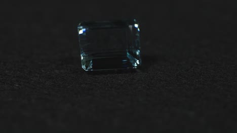 polished blue gemstone rotates and sparkles