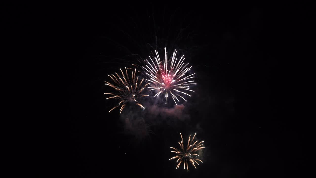 Real colorful fireworks festival background on New year party or celebration event