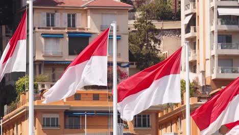 red and white flags waving in monte carlo