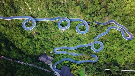 aerial drone shot of the whole curved kart race track in theme park, tonglu, china