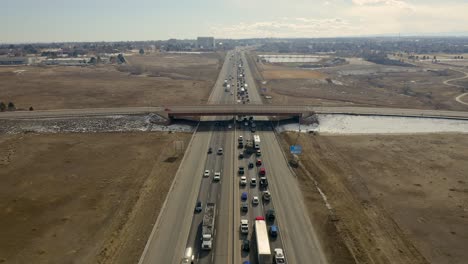 aerial view shows traffic jam and bridge on highway