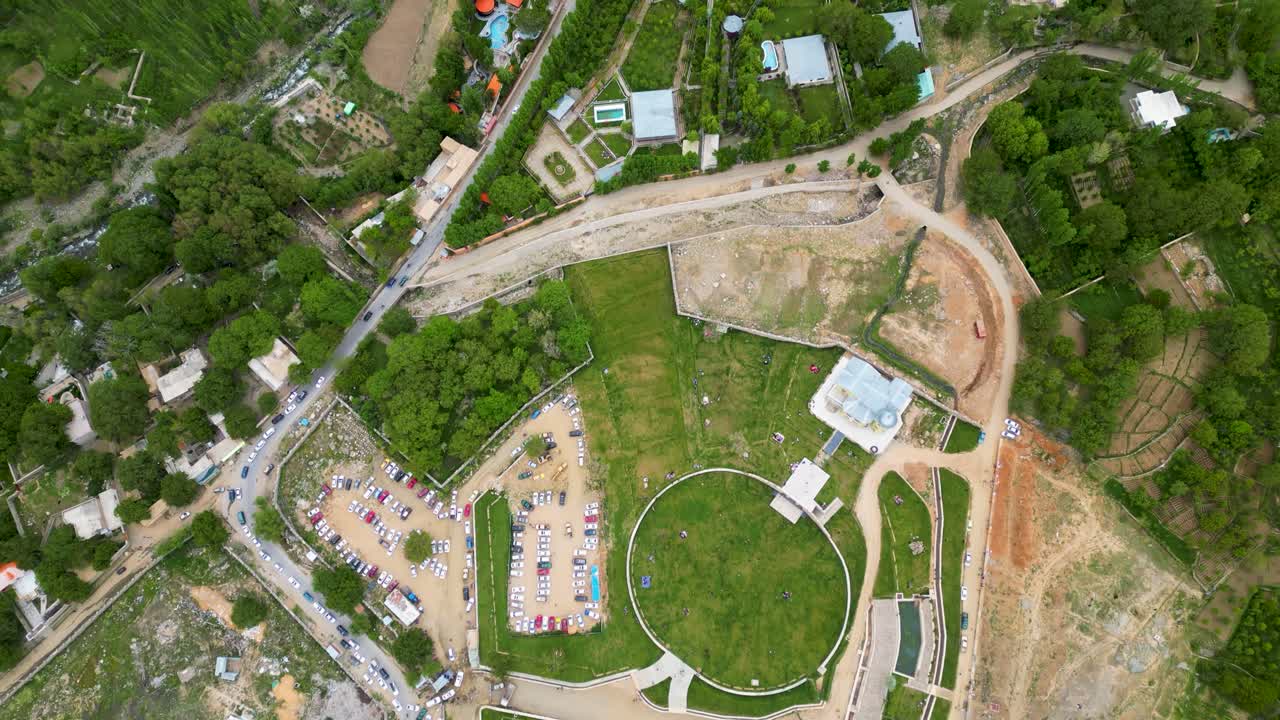 Kabul Aerial drone view of agricultural farm land in a lush, rugged mountain valley in Afghanistan