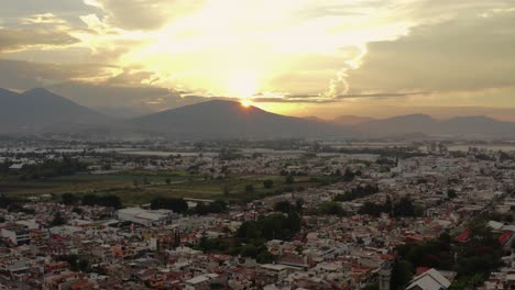 AERIAL:-Zamora,-Michoacan,-Mexico,-Mountains,-Sunset
