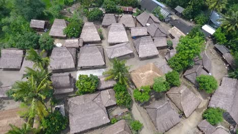 traditional wooden huts in sade village on lombok island, indonesia, aerial view