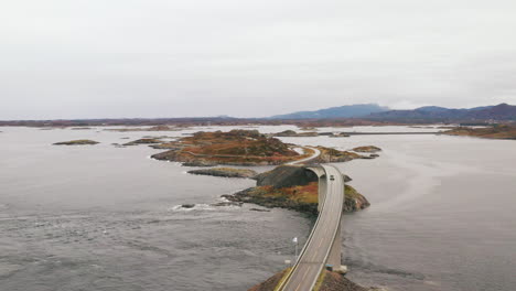 Vehicle-Crossing-Atlantic-Ocean-Road-At-Storeseisundet-Bridge-in-More-and-Romsdal-County,-Norway