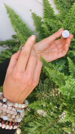 applying essential oil rollerball