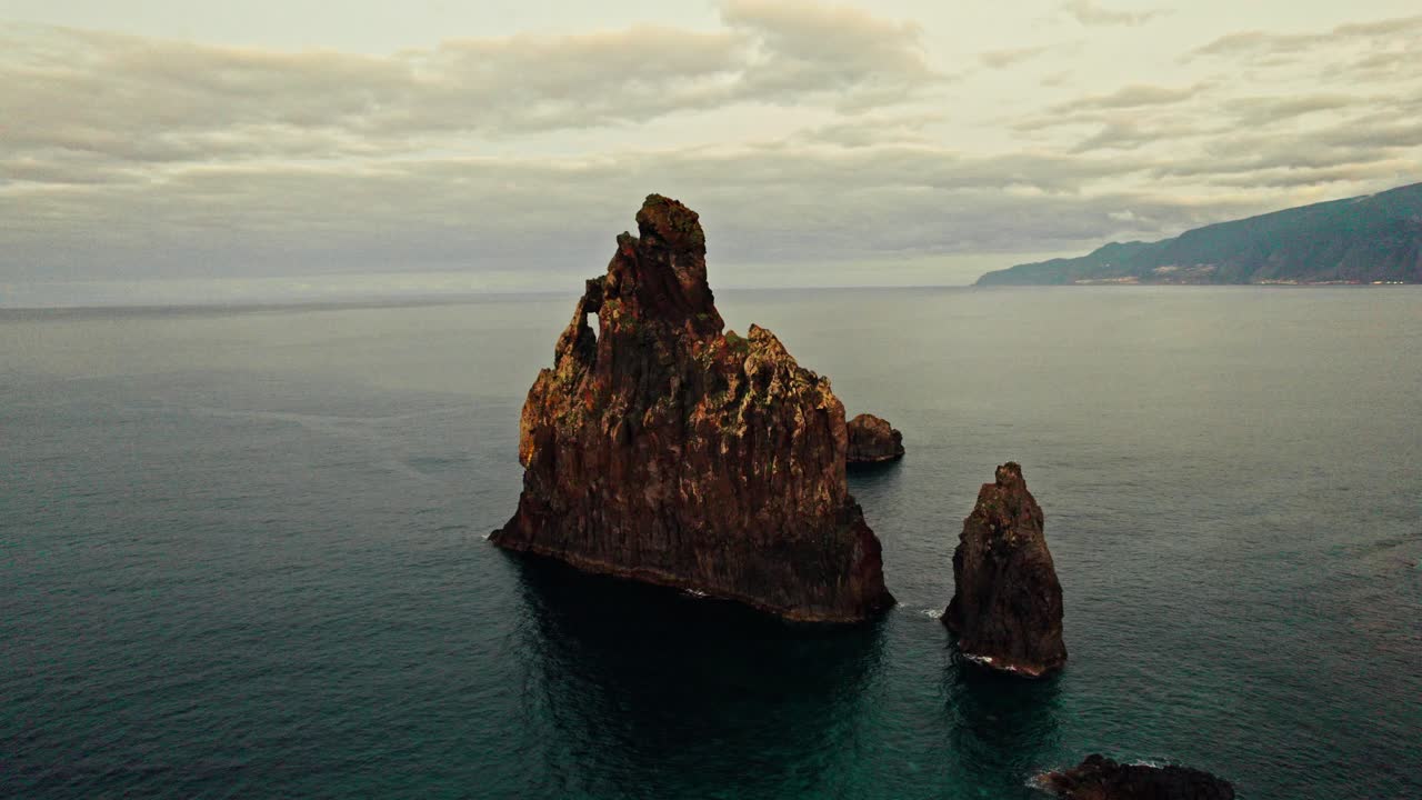 Dramatic Volcanic Rock Formation at Sea