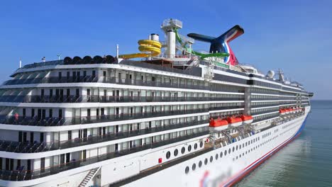 closeup view of luxury cruise ship with lifeboats on a sunny day in amber cove terminal in dominican republic