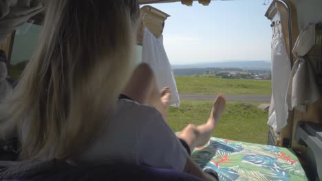 nomadic woman settling into the bed of her