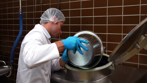 brewery worker checking the product